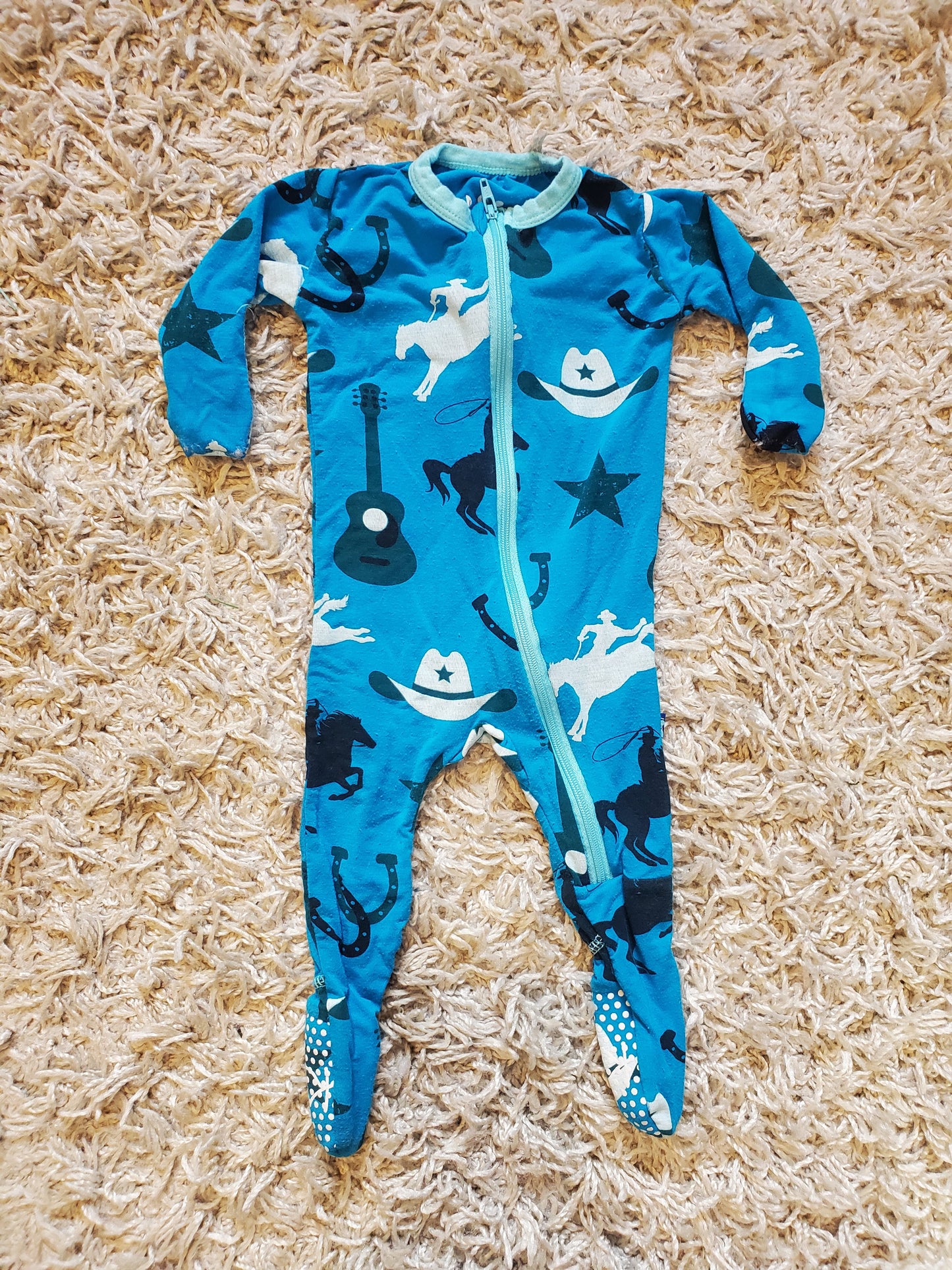 KicKee Pants sleeper. Size 0-3 months. Very good used condition. Cowboy themed.