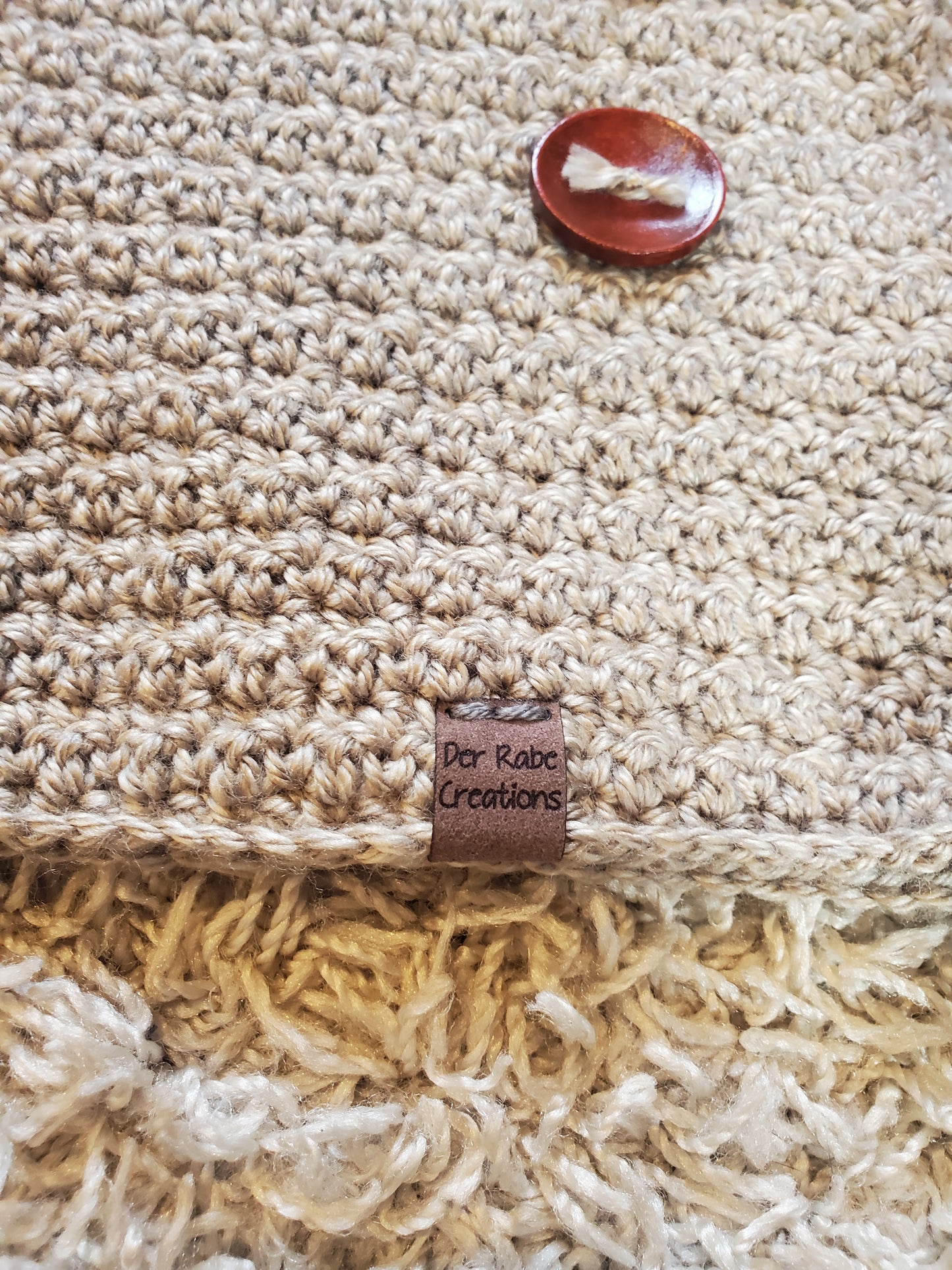 Der Rabe Creations hooded poncho. Size 0-6 months. Handcrafted. New.