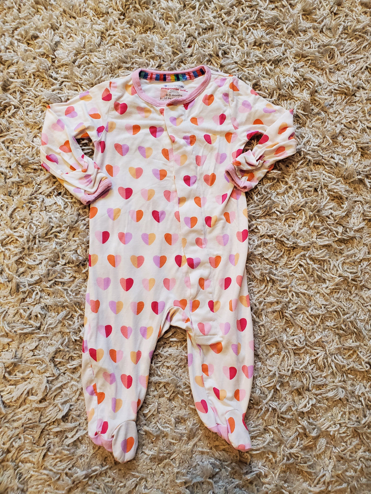Magnetic Me sleeper. Good used condition. Minor pilling and small mark on left sleeve. Size 0-3 months.