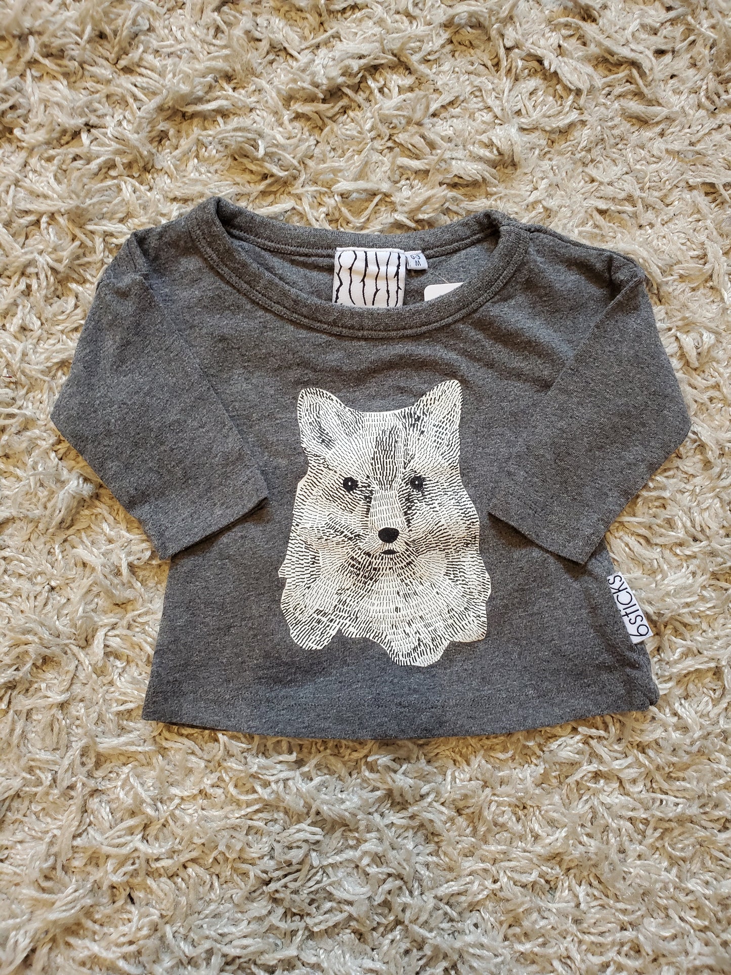 6 sticks long sleeve t-shirt. Size 0-3 months. Excellent used condition.