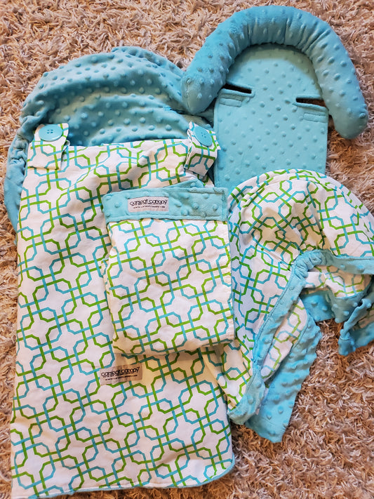 Carseat Canopy brand . 5 piece carseat cover set. Includes lap blanket, head rest, cover sheet, Canopy cover & sunshade. Minky and cotton fabrics.