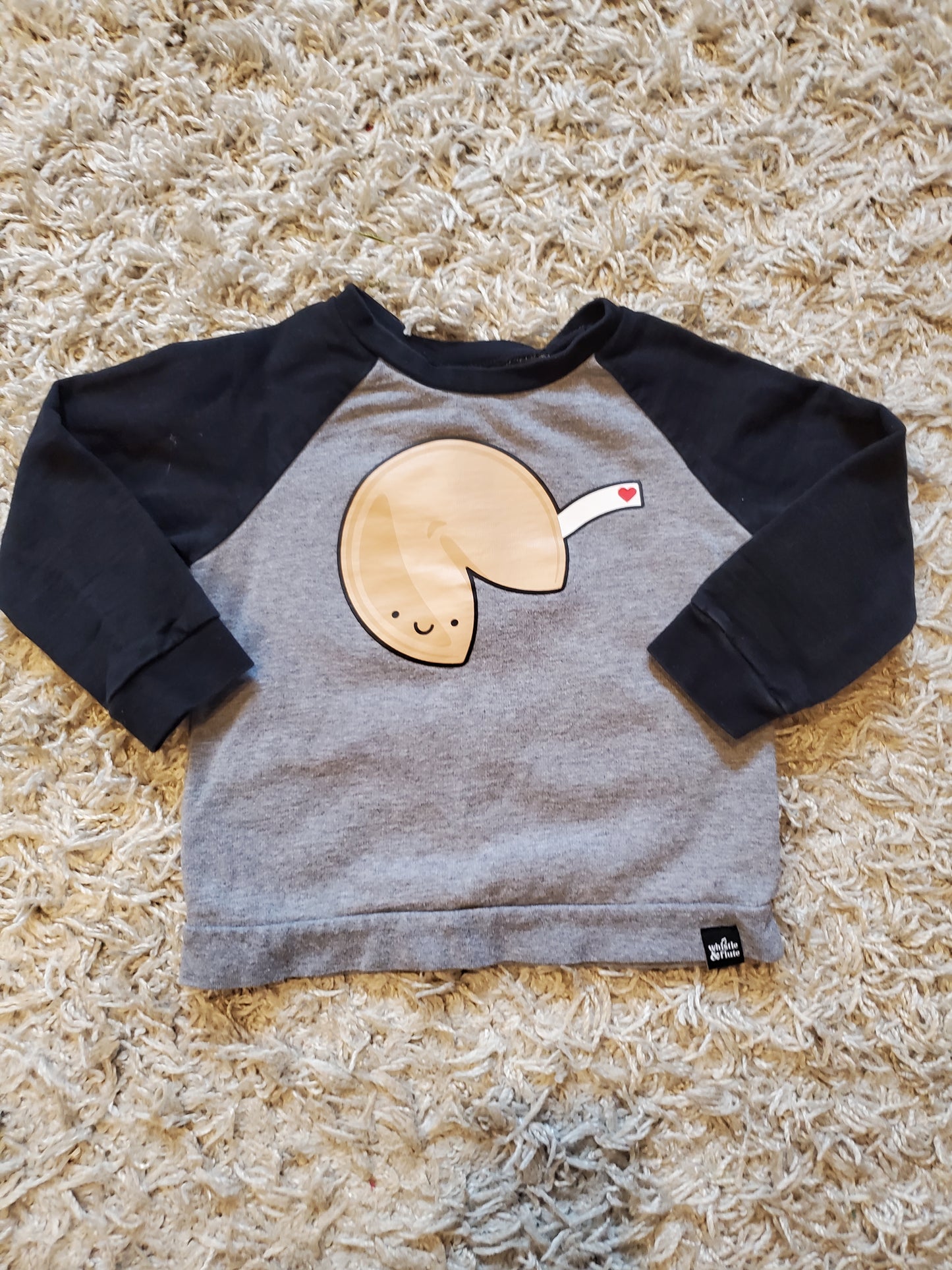Whistle and Flute sweatshirt. Very good used condition. Minor fading on sleeves at cuffs. Size 1-2 years.