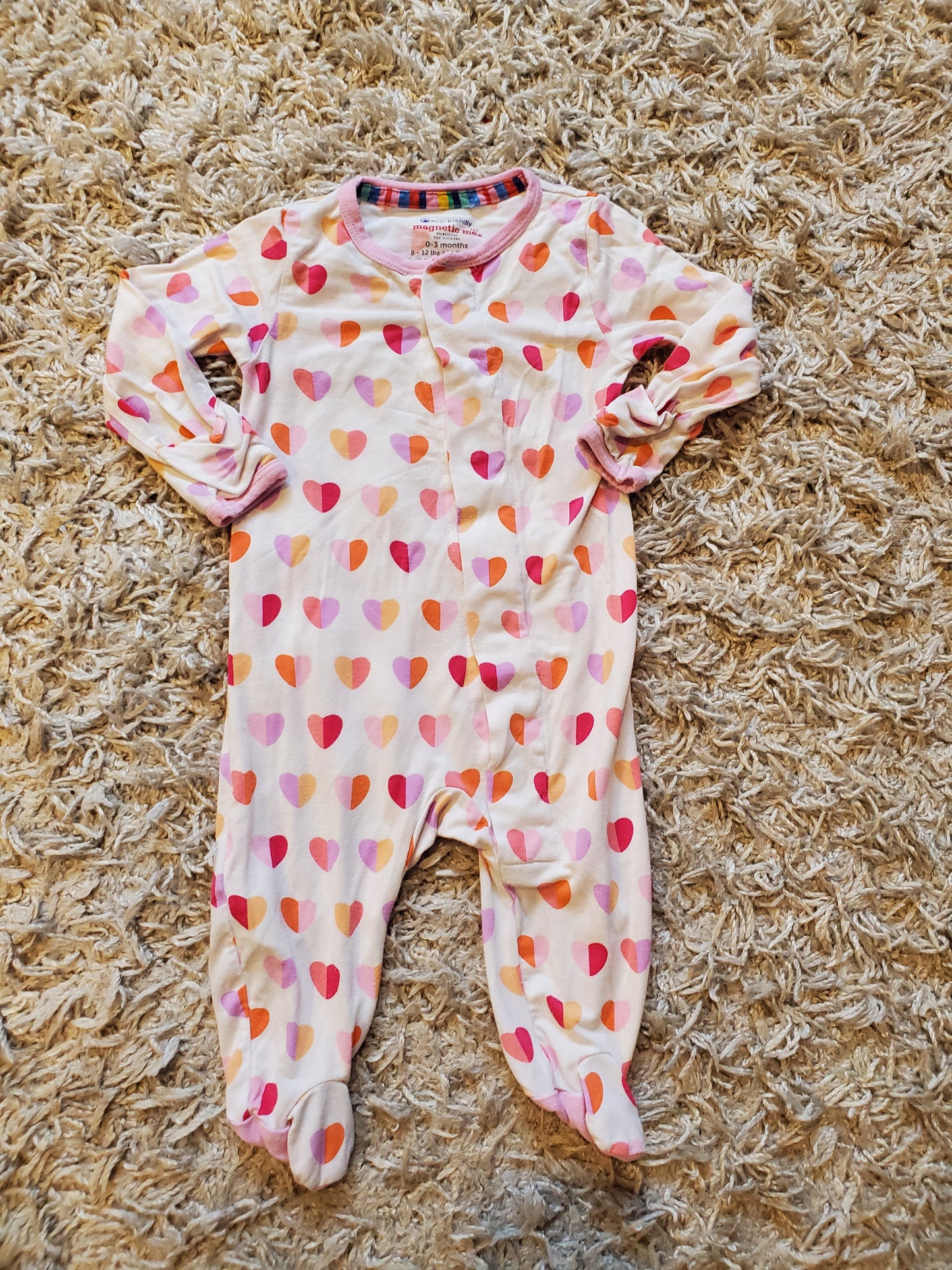 Magnetic Me sleeper. Good used condition. Minor pilling and small mark on left sleeve.  Size 0-3 months.
