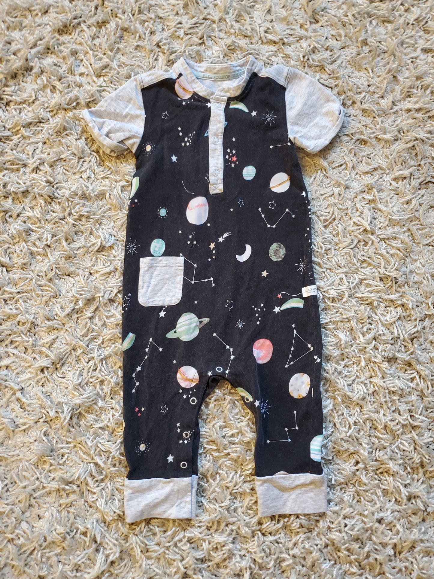 Lou Lou Lollipop romper. Size 12-18 months.  Super cute planetary fabric. Very good used condition.