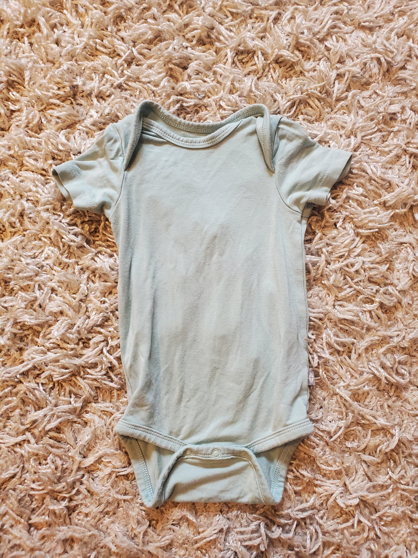 Kyte bodysuit. Size 0-3 months.